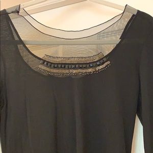 Black top with mesh and sequin details